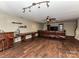 Finished basement featuring a bar area, sectional sofa, and entertainment center at 8218 Houston Ridge Rd, Charlotte, NC 28277