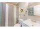 Functional bathroom featuring a shower with striped curtain, and a vanity at 8624 Canter Post Dr, Charlotte, NC 28216