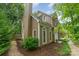 Charming exterior with chimney and arched windows at 8624 Canter Post Dr, Charlotte, NC 28216