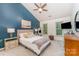 Stylish main bedroom features neutral tones, artwork, an ensuite, and ample natural light at 8624 Canter Post Dr, Charlotte, NC 28216