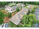 Aerial view of property showcasing surrounding neighborhood and lush greenery at 945 Heritage Pkwy, Fort Mill, SC 29715