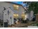 View of the rear exterior and yard at dusk at 945 Heritage Pkwy, Fort Mill, SC 29715