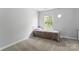 Comfortable bedroom with a window and soft light at 945 Heritage Pkwy, Fort Mill, SC 29715