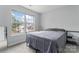 Cozy bedroom featuring a large window offering ample natural light and an exterior view at 945 Heritage Pkwy, Fort Mill, SC 29715