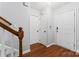 Inviting entryway featuring wood flooring and crisp white doors at 945 Heritage Pkwy, Fort Mill, SC 29715