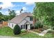 Well-manicured lawn of a home with neutral siding, complemented by dark shutters and a lush lawn at 945 Heritage Pkwy, Fort Mill, SC 29715