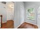 Hallway leads to bedrooms with natural light from window at 945 Heritage Pkwy, Fort Mill, SC 29715