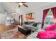 Comfortable living room showcases stylish decor and natural light from windows, flowing into kitchen and dining areas at 945 Heritage Pkwy, Fort Mill, SC 29715