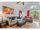 Bright living room with a large window and sliding glass door providing abundant natural light at 945 Heritage Pkwy, Fort Mill, SC 29715