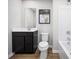 Functional bathroom with a vanity, toilet, and shower-tub combination, designed with clean lines and practical layout at 10124 Florentine Way, Charlotte, NC 28214