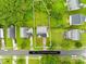 Aerial view of the property showing boundaries, surrounding trees, and neighborhood at 1023 Valley Ridge Rd, Charlotte, NC 28214