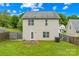 This home has a spacious backyard with a back patio and a privacy fence at 1023 Valley Ridge Rd, Charlotte, NC 28214