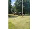 Charming home with well-maintained lawn and mature trees in a serene, picturesque setting at 10500 Bethel Church Rd, Midland, NC 28107