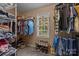 Walk-in closet with ample storage and custom organization features, and natural light at 10703 Back Ridge Rd, Charlotte, NC 28277