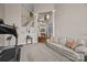 Spacious living room featuring a neutral color palette and open staircase to upper level at 10703 Back Ridge Rd, Charlotte, NC 28277