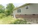 Backyard of house featuring vinyl siding and a brick foundation at 119 Wade Dr, Kings Mountain, NC 28086