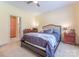 Bedroom features carpet, neutral walls, and a view to the en-suite bathroom at 119 Wade Dr, Kings Mountain, NC 28086