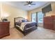 Cozy bedroom with neutral walls, ceiling fan, carpet, and large windows at 119 Wade Dr, Kings Mountain, NC 28086