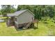 Exterior of home features a wooden deck, siding, and a well-maintained lawn at 119 Wade Dr, Kings Mountain, NC 28086