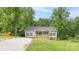 Charming single-story home with a inviting front porch and manicured lawn at 119 Wade Dr, Kings Mountain, NC 28086