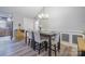 Dining room featuring a pendant light fixture, wainscoting, and a table with seating at 121 Jefferson Dr, Locust, NC 28097