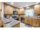 Well-equipped kitchen with granite countertops and stainless steel appliances at 121 Jefferson Dr, Locust, NC 28097