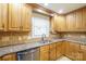 Beautiful kitchen with granite counters, tile backsplash, and stainless steel dishwasher at 121 Jefferson Dr, Locust, NC 28097