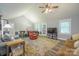 Inviting living area with vaulted ceiling, hardwood floors, and a cozy layout at 121 Jefferson Dr, Locust, NC 28097