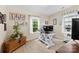 Bright office space featuring natural light, a workstation, and plank flooring at 122 Pratt St, Belmont, NC 28012