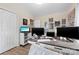 Inviting office space with a large desk, ample natural light, and a closet for storage at 122 Pratt St, Belmont, NC 28012