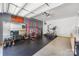 Garage space equipped with a home gym setup and storage cabinets at 12220 Huntersville Concord Rd, Huntersville, NC 28078