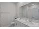 Modern bathroom features double vanity with white quartz countertops, undermount sinks, and brushed nickel faucets at 1344 Sweet Pea St, Monroe, NC 28110