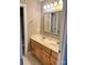 Bathroom featuring double vanity with framed mirrors, storage and tile floor at 140 Hunters Hill Dr, Statesville, NC 28677