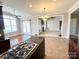 Bright kitchen featuring stainless steel appliances and an open layout connecting to living areas at 140 Hunters Hill Dr, Statesville, NC 28677