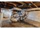 Exposed duct work runs throughout the unfinished basement in this home for sale at 1406 Upper Enochville Rd, Kannapolis, NC 28081