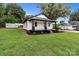 Well maintained lawn highlighting the front and side of the house at 1406 Upper Enochville Rd, Kannapolis, NC 28081