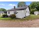 Showing the back of the house, a side entry, and storage shed at 1406 Upper Enochville Rd, Kannapolis, NC 28081