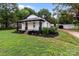 Beautifully landscaped yard showcasing the side of the home at 1406 Upper Enochville Rd, Kannapolis, NC 28081