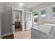This laundry room offers a sink, washer, dryer, and access to additional rooms, providing convenience and functionality at 1406 Upper Enochville Rd, Kannapolis, NC 28081