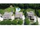 Aerial shot showing a home, its pool, landscaping and location relative to surrounding homes in the neighborhood at 14700 Old Vermillion Dr, Huntersville, NC 28078