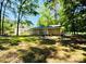 Backyard view of the house and its wooden back deck at 1583 Green Circle Dr, Gastonia, NC 28054