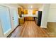 Well-lit kitchen with stainless steel appliances, attractive cabinets, and a seamless flow to the dining area at 1583 Green Circle Dr, Gastonia, NC 28054