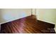 Spacious living area with beautiful hardwood flooring and natural light at 1583 Green Circle Dr, Gastonia, NC 28054