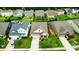 A beautiful home in a quiet neighborhood with a well-manicured lawn and mature trees at 16213 Kelby Cv, Charlotte, NC 28278
