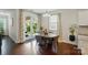 Dining area with access to backyard, hardwood floors, and natural light at 16213 Kelby Cv, Charlotte, NC 28278