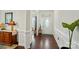 Bright entryway with hardwood floors and decorative molding, creating a welcoming first impression at 16213 Kelby Cv, Charlotte, NC 28278