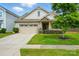 Charming one-story home with attached garage and well-maintained lawn, offering great curb appeal at 16213 Kelby Cv, Charlotte, NC 28278