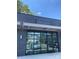Modern commercial building with large glass windows and 'Khali Yoga' signage at 1713 Shamrock Dr, Charlotte, NC 28205