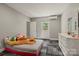 Cozy bedroom with a plush bed, a modern dresser, and comfortable air conditioning at 1819 Brompton Ct, Newton, NC 28658