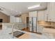 Modern kitchen featuring stainless steel appliances, granite countertops, and hardwood floors at 1819 Brompton Ct, Newton, NC 28658